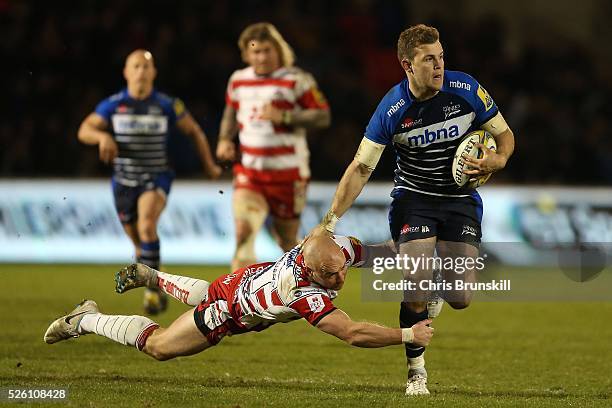 Will Addison of Sale Sharks is tackled by Willi Heinz of Gloucester Rugby during the Aviva Premiership match between Sale Sharks and Gloucester Rugby...