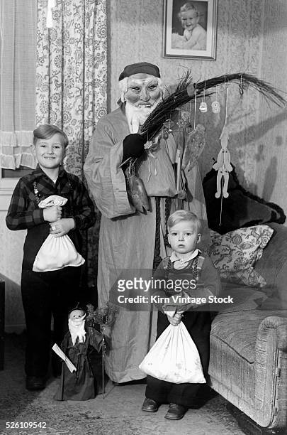 St. Nick visits with two German brothers, ca. 1948