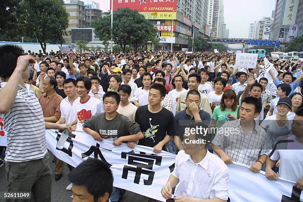 Chinese protesters march through the streets of Shenzhen protesting Japan's dealing with its wartime past, 10 April 2005, in China's most famous...
