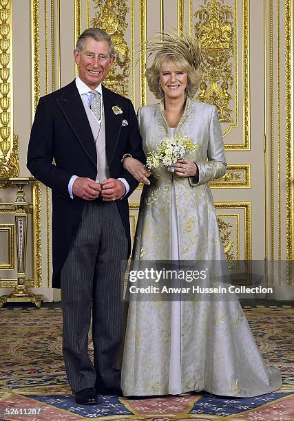 Prince Charles and The Duchess Of Cornwall, Camilla Parker Bowles pose in the white drawing room for the Official Wedding group photo following their...