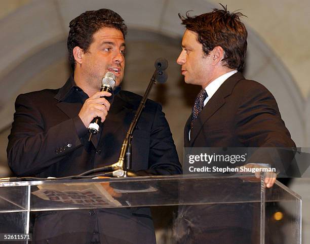 Producer Brett Ratner and actor Chris Katten speak at Chrysalis' Fourth Annual Butterfly Ball at a private residence on April 9, 2005 in Bel Air,...