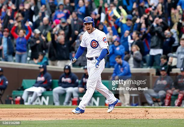 Matt Szczur of the Chicago Cubs reacts after hitting a grand slam in the eighth inning against the Atlanta Braves at Wrigley Field on April 29, 2016...