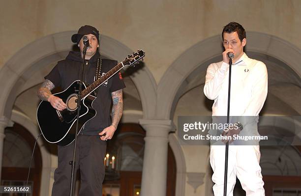 Musicians Benji Madden and Joe Madden of Good Charlotte perform at Chrysalis' Fourth Annual Butterfly Ball at a private residence on April 9, 2005 in...