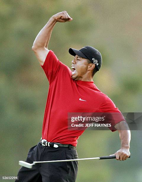 Tiger Woods of the US celebrates winning the 2005 Masters Golf Tournament Championship 10 April 2005 at the Augusta National Golf Club in Augusta,...