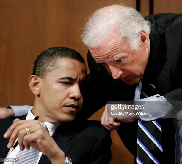 Sen. Joseph Biden speaks with Sen. Barack Obama during a Senate Foreign Relations Committee hearing on Capitol Hill April 11, 2005 in Washington, DC....