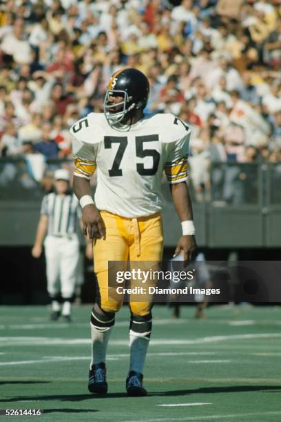 Defensive lineman Joe Greene of the Pittsburgh Steelers awaits the next play during a game on October 14, 1973 against the Cincinnati Bengals at...