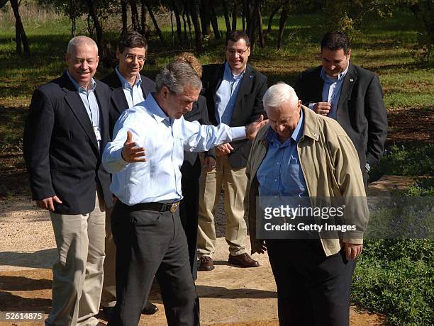 Israeli Prime Minister Ariel Sharon and his staff are greeted by President George W. Bush upon Sharon's arrival to Bush's ranch April 11, 2005 in...