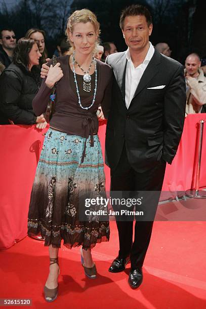 Giulia Siegel-Wehrmann and her husband Hans Wehrmann, attend the "Babynator" film premiere at the Maxx cinema on April 11, 2005 in Munich, Germany.
