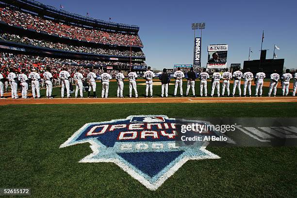 The New York Mets stand for the National Anthem before their home opening game against the Houston Astros April 11, 2005 at Shea Stadium in Flushing,...