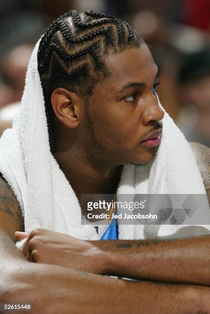 Carmelo Anthony of the Denver Nuggets rests during the game against the Sacramento Kings at Arco Arena on January 11, 2005 in Sacramento, California....