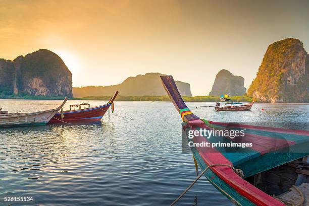 beach and tropical sea with long-tail boat in thailand - thailand landscape stock pictures, royalty-free photos & images