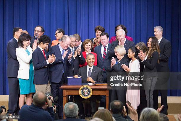 President Barack Obama signed the Every Student Succeeds Act on Dec. 10, 2015. Stage Participants: �� 8 graders Antonio Martin, and Sofia Rios from...