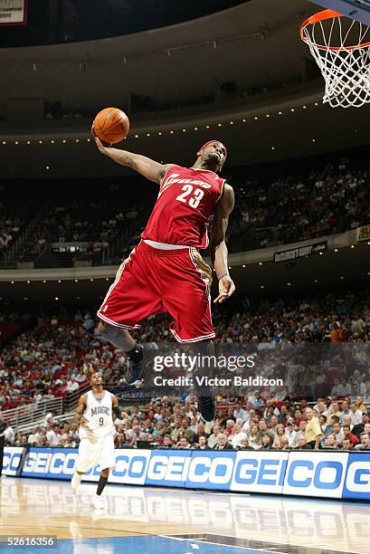 LeBron James of the Cleveland Cavaliers dunks against the Orlando Magic during NBA action on April 11, 2005 at TD Waterhouse Centre in Orlando,...