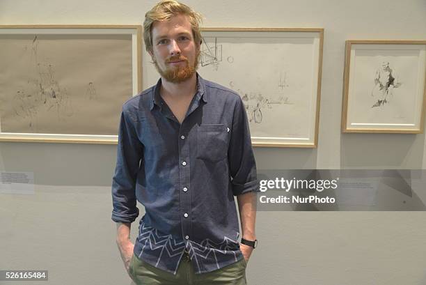 The reportage illustrator standing in his exhibition at the Imperial War Museum in Salford, Greater Manchester, England, on Sunday 23rd August 2015....