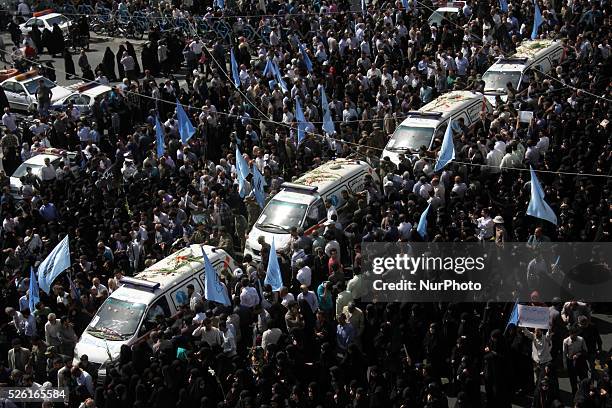 Iranians mourn during a funeral procession for some of the Iranian pilgrims who were killed in a stampede at the annual hajj on October 4, 2015 in...