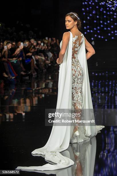 Irina Shayk walks the runway for the latest collection by Pronovias 2017 on April 29, 2016 in Barcelona, Spain.