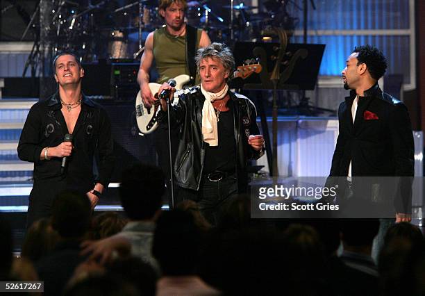 Singers Rob Thomas, Rod Stewart and John Legend perform at "Save The Music: A Concert To Benefit The VH1 Save The Music Foundation" at the Beacon...