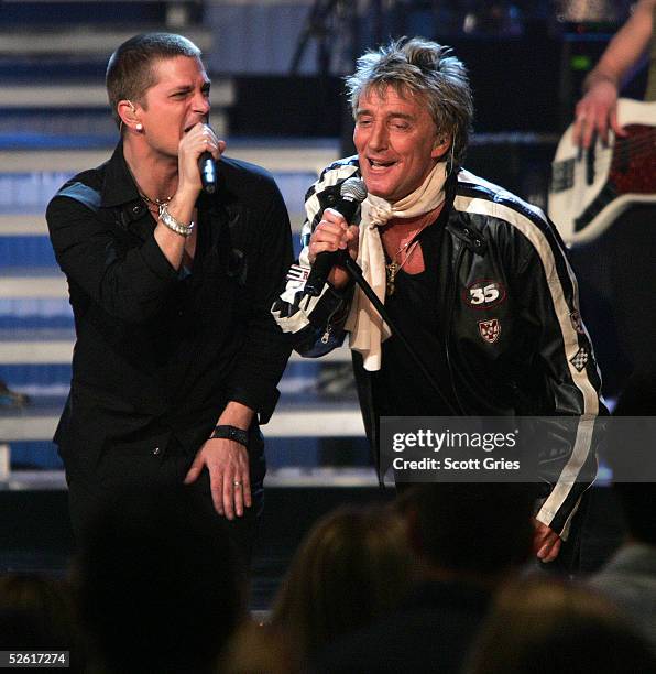 Singers Rob Thomas and Rod Stewart perform at "Save The Music: A Concert To Benefit The VH1 Save The Music Foundation" at the Beacon Theater April...