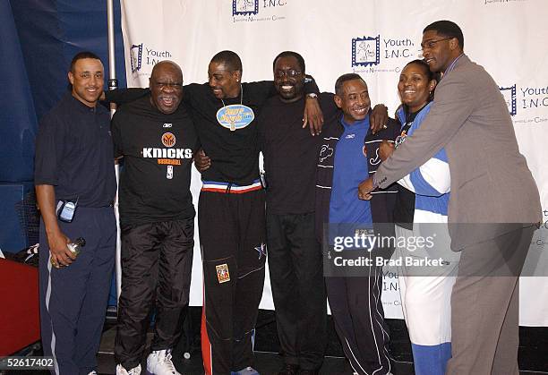 John Starks, Cal Ramsey, Michael Richardson, Earl Monroe, Dean Meminger, Kim Hampton and Charles Smith pose for photos at the 2005 Net Gain...