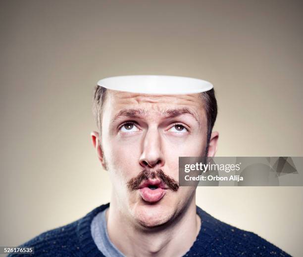 portrait of young man with empty head - cerebrum stock pictures, royalty-free photos & images