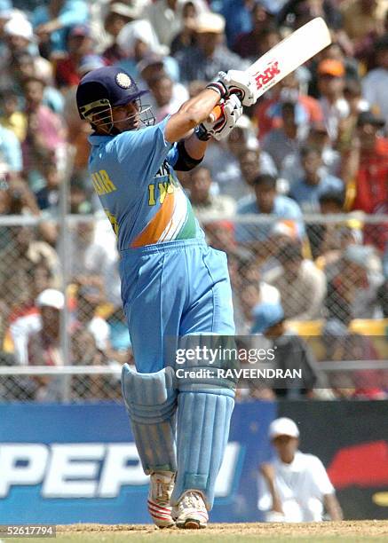 Indian cricketer Sachin Tendulkar plays a pull shot during the fourth one day international between India and Pakistan at the Sardar Patel Cricket...