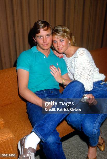 American actor Christopher Atkins poses with fiancee Lynne Barron at Charles Kinsford Smith airport media room in 1985 in Sydney, Australia.