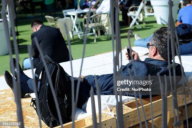 Congressman taking a break, during the last day of Mobile World Congress in Barcelona, 24th of February, 2016.