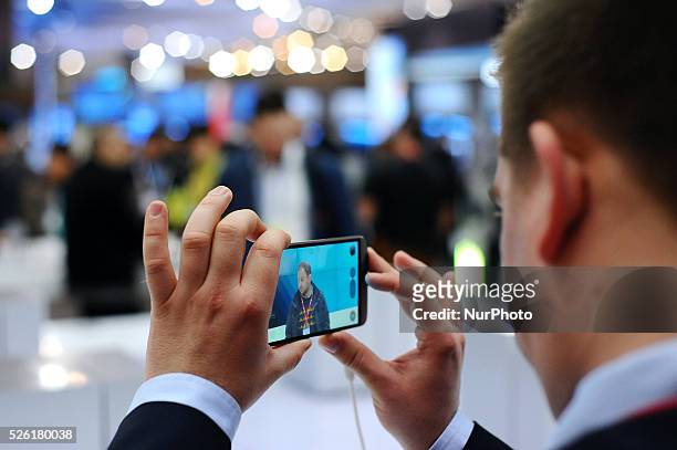 Congressman testing the camera of the new LG G5, during the last day of Mobile World Congress in Barcelona, 24th of February, 2016.