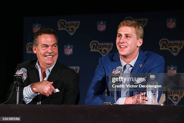 Head coach Jeff Fisher and quarterback Jared Goff of the Los Angeles Rams speak onstage during a press conference to introduce Goff, the first...