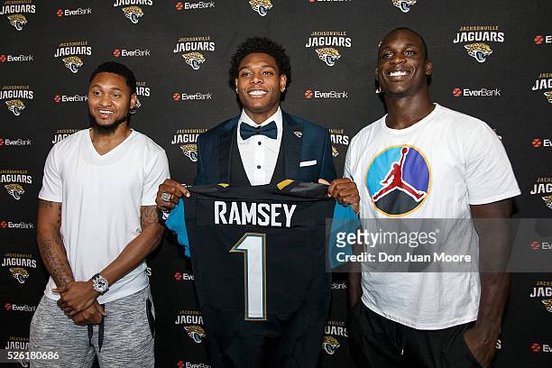 Wide Receiver Rashad Greene, Cornerback Jalen Ramsey and Linebacker Telvin Smith of the Jacksonville Jaguars pose together for a photo after a press...