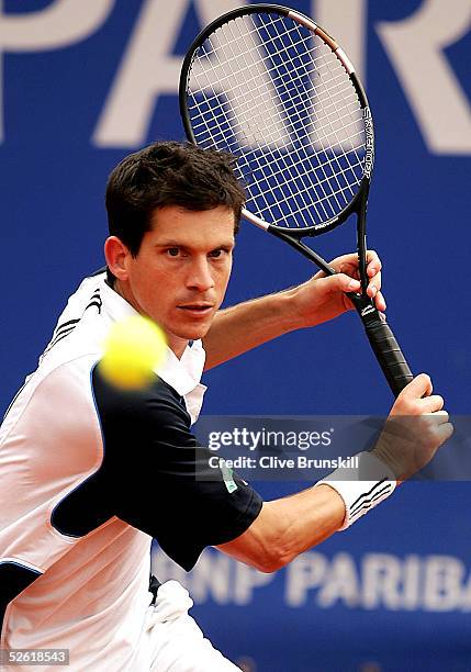 Tim Henman of Great Britain plays a backhand against Mariano Zabaleta of Argentina in his first round match during the ATP Masters Series at the...