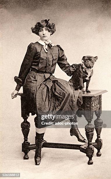 Sidonie Gabrielle Colette called Colette , french writer, born at Saint-Sauveur-en-Puisaye . Here dressed as Claudine with Toby-Chien. Ca. 1900.