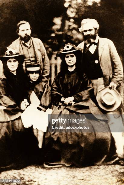 Karl Marx , German philosopher, political economist, and revolutionary. Surrounded by his daughters and Friedrich Engels . In London in 1864.