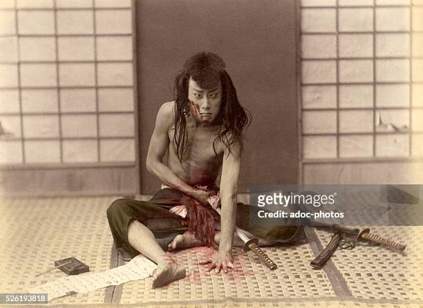 Samurai commiting seppuku , ca. 1880.