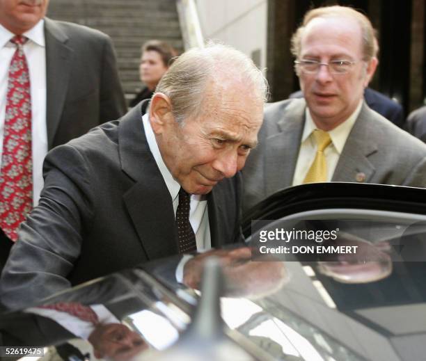 The former head of insurer AIG, Maurice Greenberg climbs into his car as he leaves after meetings with New York Attorney General Eliot Spitzer 12...