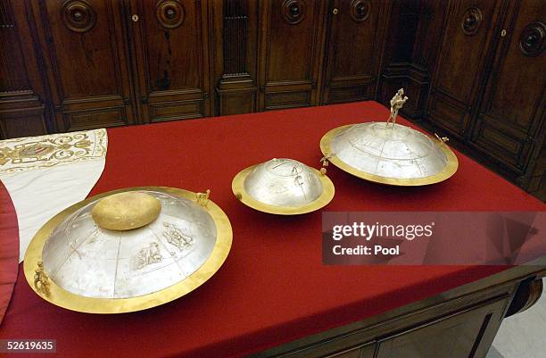 The ballot boxes that will be used by cardinals for the next conclave sit on a table April 12, 2005 in Vatican City. Roman Catholicism's conclave to...