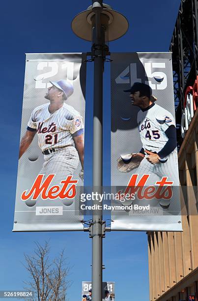 Banners of former New York Mets players Cleon Jones and Tug McGraw hangs outside Citi Field, home of the New York Mets baseball team in Flushing, New...