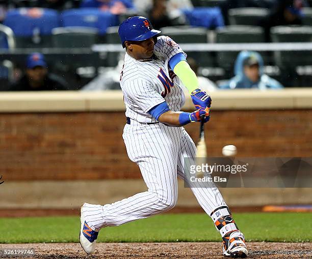 Yoenis Cespedes of the New York Mets hits a grand slam in the third inning against the San Francisco Giants at Citi Field on April 29, 2016 in the...