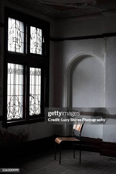 chair facing a window. - lucy shires - fotografias e filmes do acervo