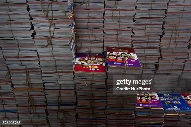 Books are stacked inside a store of a school in Dhaka, Bangladesh on January 1, 2016. Distribution of new books to the students of new classes is...