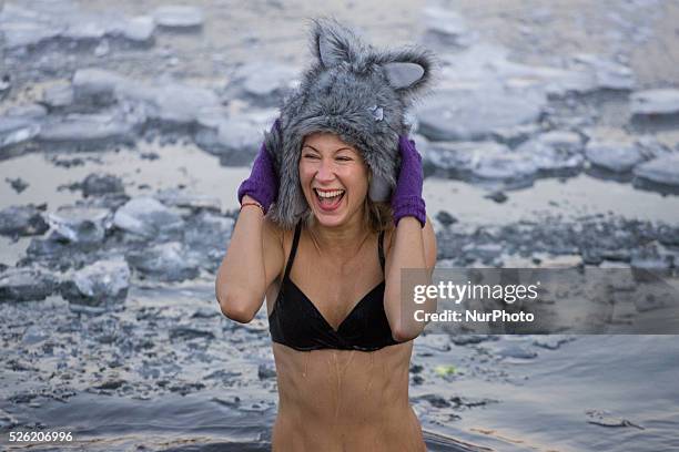 Bydgoszcz, Poland, 02 Jauary 2016 - People go swimming outdoors after nights of frost. After temperatures hit record highs in December the new year...