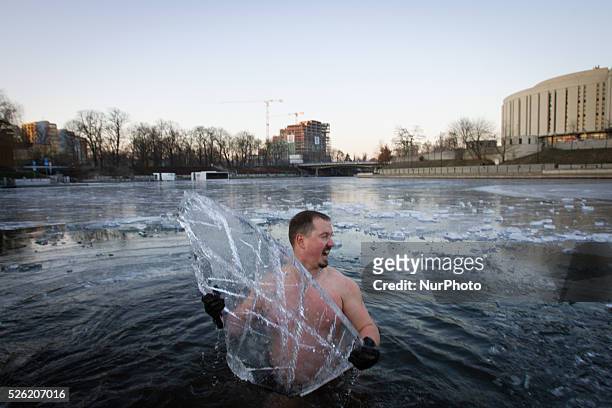 Bydgoszcz, Poland, 02 Jauary 2016 - People go swimming outdoors after nights of frost. After temperatures hit record highs in December the new year...
