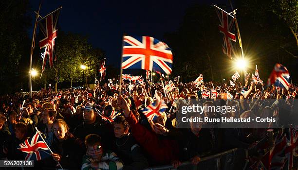 Crowds attend The Diamond Jubilee Concert and The Lighting Of The National Beacon by Queen Elizabeth II at Buckingham Palace.