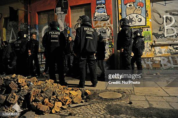 Check policemen before the press conference to Riga Street on in Berlin, Germany people. The inhabitants of the occupied house Liebigstra��e 34 today...