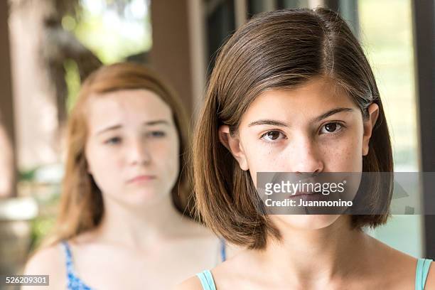 serious teenage girls - toxic friendship stock pictures, royalty-free photos & images