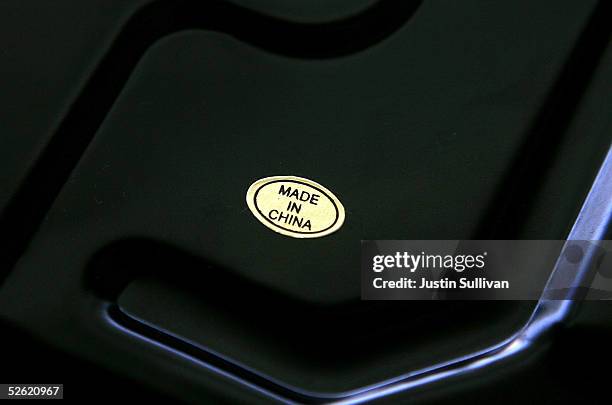 Sticker with the words "Made in China" is seen on the bottom of a scale April 12, 2005 in San Francisco. Aggravated by surging imports of oil and...