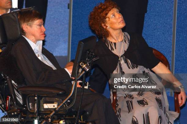 British astrophysicist Stephen Hawking and an unidentified person attend his conference at the "Prince of Asturias" Auditorium on April 12, 2005 in...