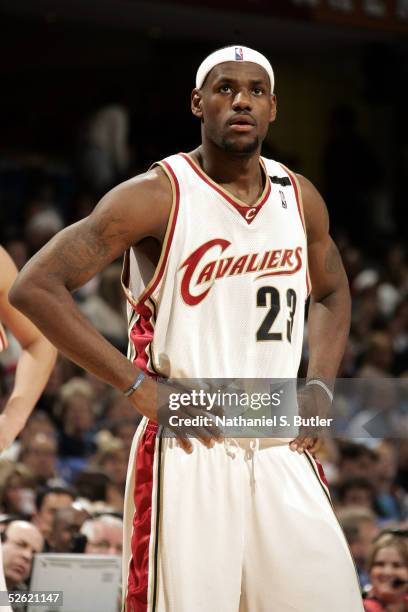 LeBron James of the Cleveland Cavaliers stands on the court during the game against the Sacramento Kings on April 1, 2005 at Gund Arena in Cleveland,...