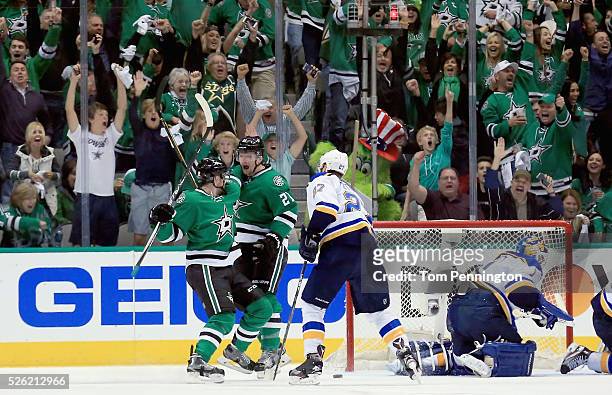 Antoine Roussel of the Dallas Stars celebrates with Radek Faksa of the Dallas Stars after scoring a goal against Brian Elliott of the St. Louis Blues...