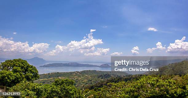 taal volcano on a sunny day with lush trees - taal volcano 個照片及圖片檔